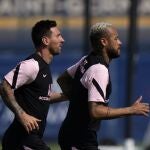 Lionel Messi y Neymar , durante un entrenamiento del PSG