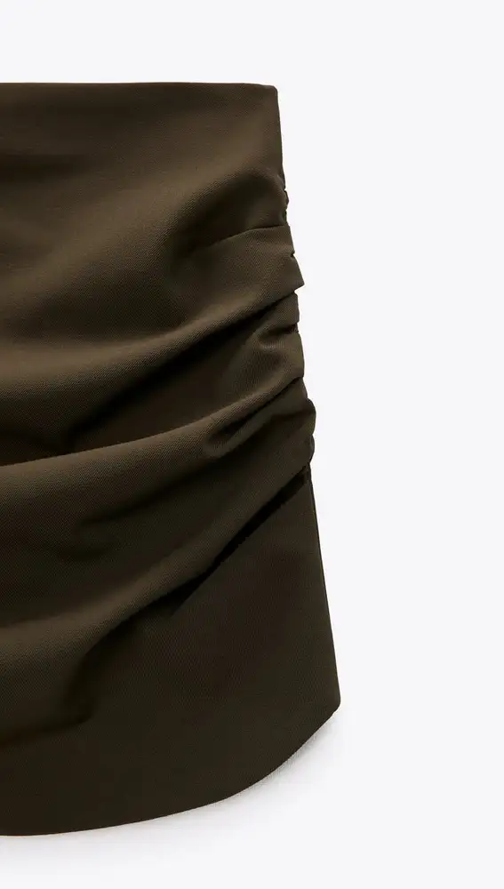 Falda mini pliegues.
