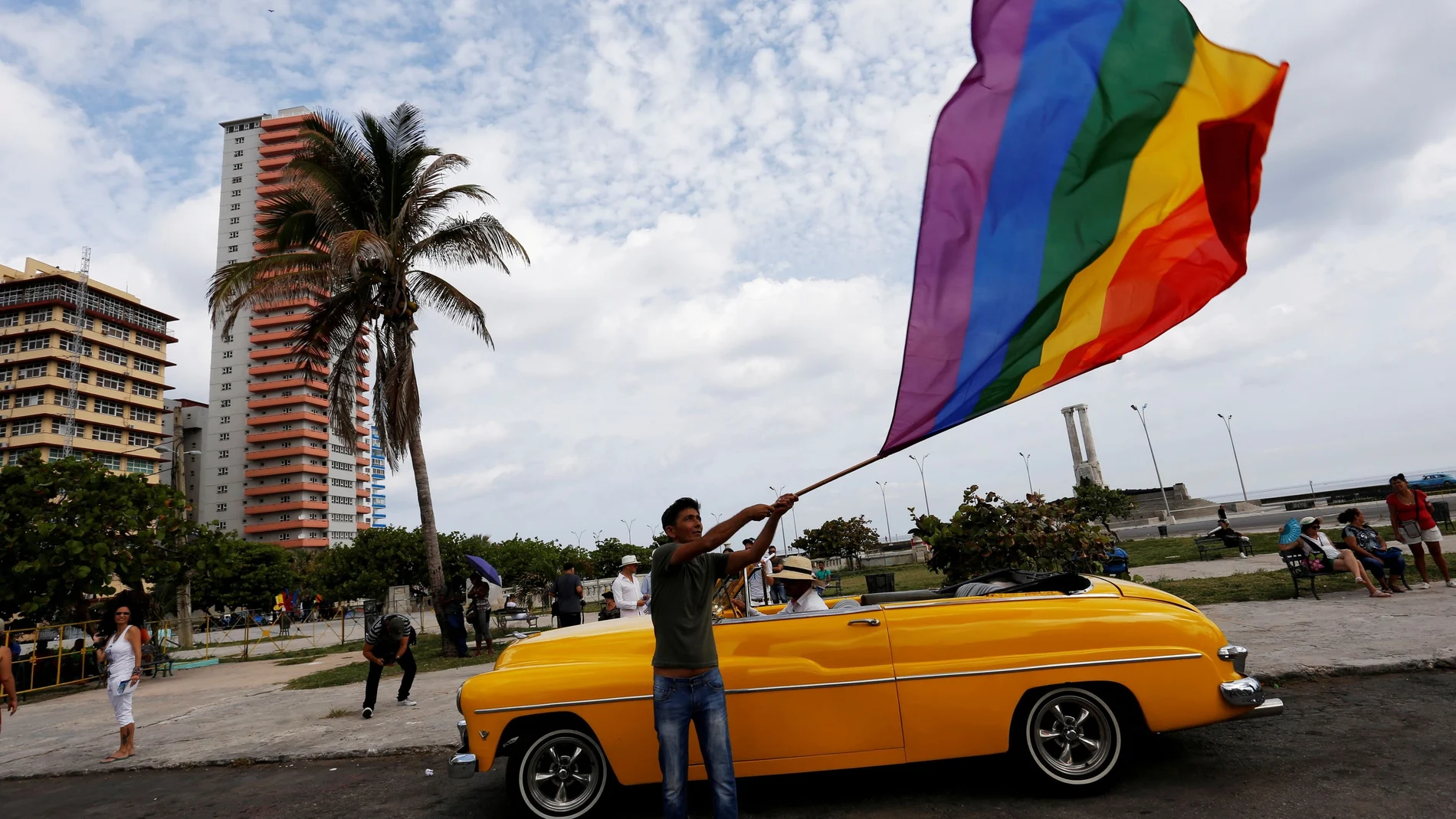 FILE PHOTO: Participant waves a rainbow flag during the annual March against Homophobia and Transphobia in Havana, Cuba May 13, 2017. REUTERS/Stringer/File Photo
