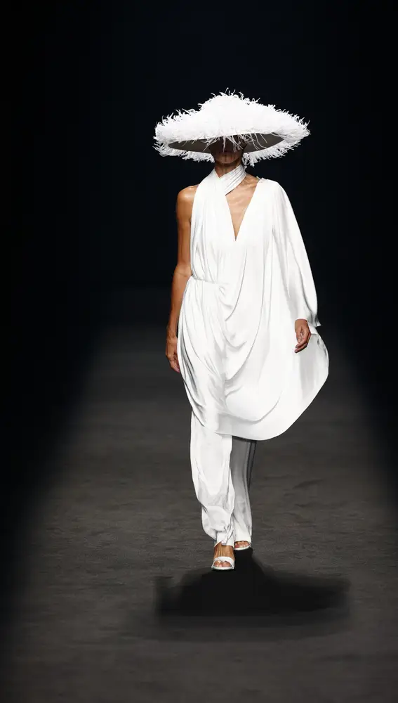 A model wears at collection runway a creation from “ Isabel Sanchis “ during Pasarela Cibeles Mercedes-Benz Fashion Week Madrid 2021 in Madrid, on 18 September 2021.