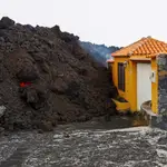 Imagen de una de las casas de la isla de La Palma sepultadas por la lava