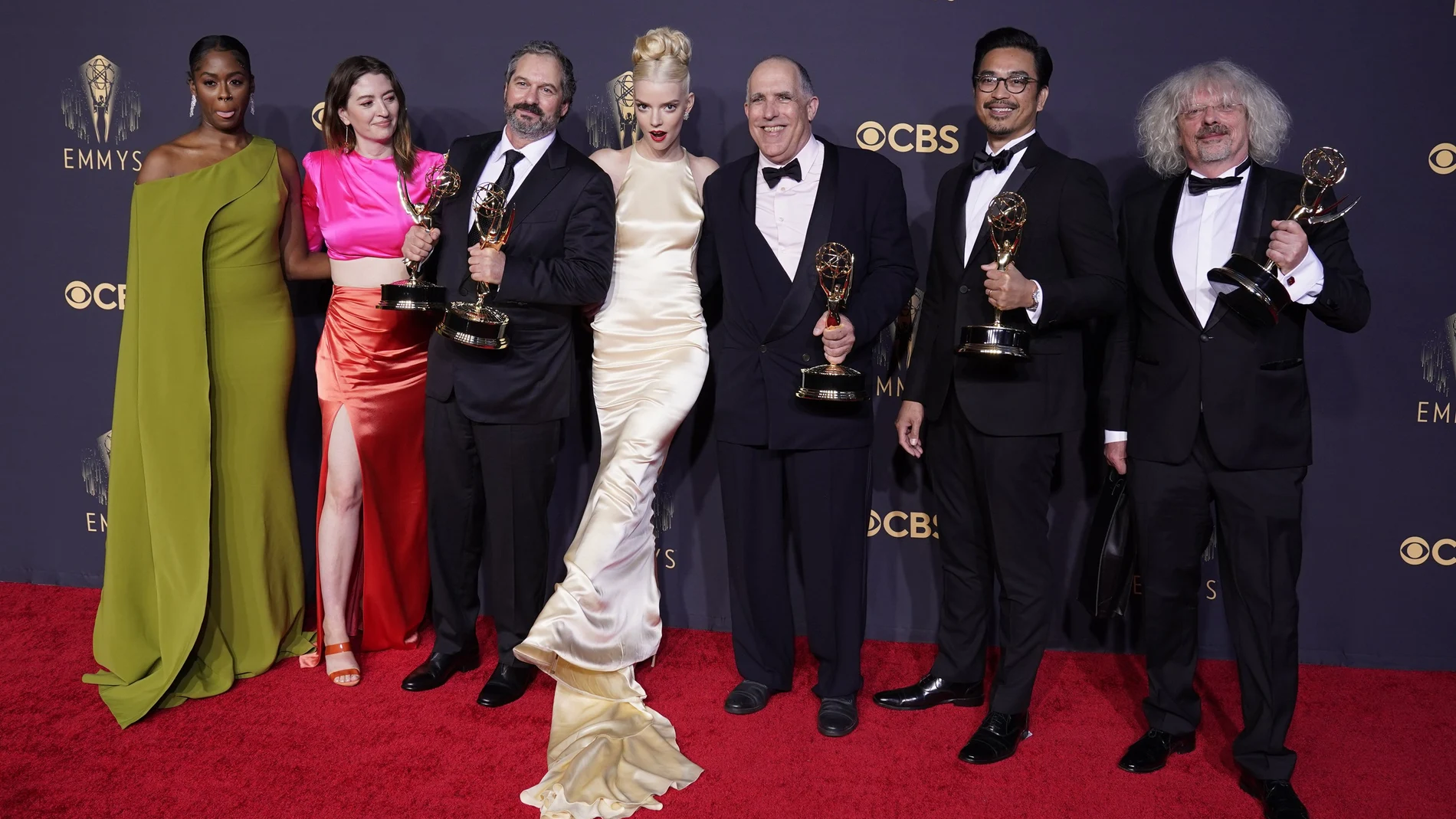 Moses Ingram, from left, Marielle Heller, Scott Frank, Anya Taylor-Joy, William Horberg, Mick Aniceto and Marcus Loges, winners of the award for outstanding directing for a limited or anthology series or movie for "The Queen's Gambit", pose at the 73rd Primetime Emmy Awards on Sunday, Sept. 19, 2021, at L.A. Live in Los Angeles. (AP Photo/Chris Pizzello)