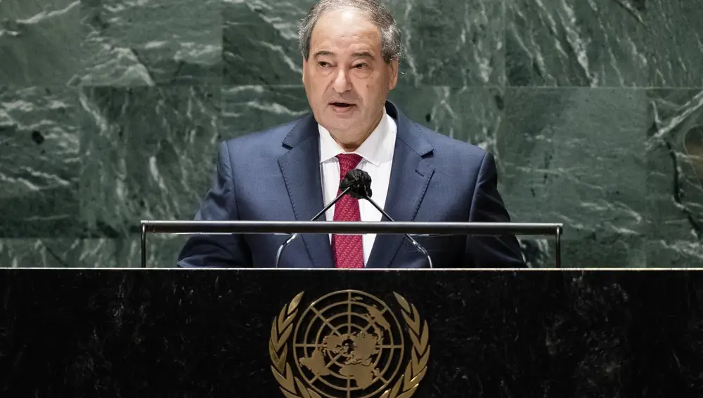 Syria's foreign minister Faisal Mekdad addresses the 76th Session of the United Nations General Assembly, Monday, Sept. 27, 2021, at U.N. headquarters. (AP Photo/John Minchillo, Pool)