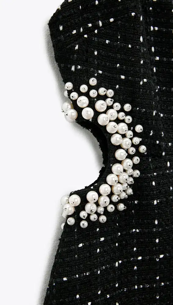 Vestido estructura perlas.