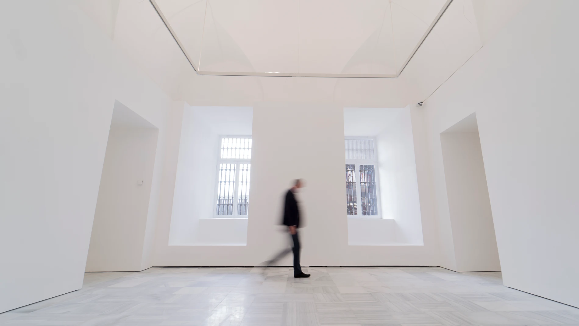 Una persona pasa por una de las nuevas salas del edificio Sabatini, en el Museo Reina Sofía