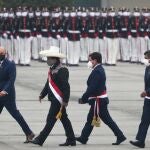 FILE PHOTO: Peru's President Pedro Castillo attends a military parade with Prime Minister Guido Bellido Ugarte, and Defence Minister Walter Ayala, during Independence Day celebrations, in Lima, Peru, July 30, 2021. REUTERS/Sebastian Castaneda/File Photo