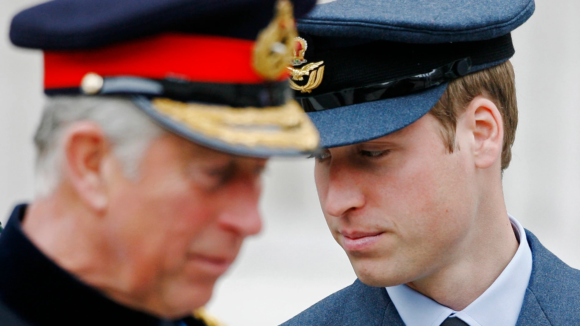 Britain's Princes Charles and his son Prince William leave after attending a Service of Commemoration to mark the end of combat operations in Iraq, at St Paul's Cathedral in London