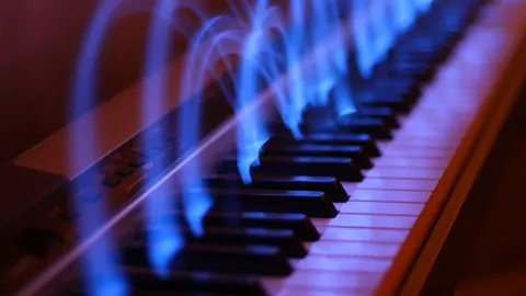 Recreación artística de una superposición cuántica de notas musicales.
