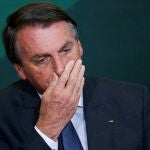 El presidente Jair Bolsonaro reacciona en el Palacio Planalto, en Brasil