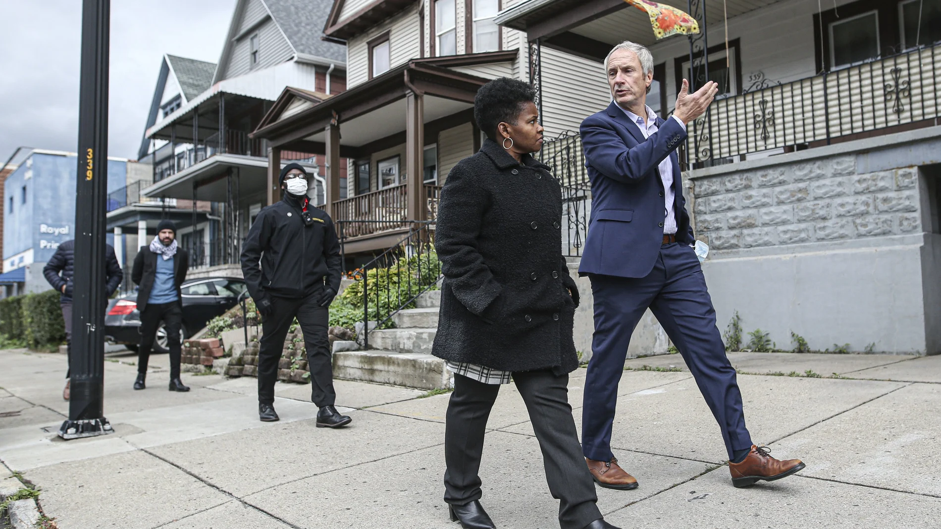 FILE - In this Saturday, Oct. 23, 2021, file photo, Buffalo mayoral candidate India Walton, front left, and New York Sen. Sean Ryan take part in a walking tour of local businesses in Buffalo, N.Y. The race for mayor of Buffalo has four-term incumbent Byron Brown relying on a write-in campaign to fend off a challenge from newcomer Walton, who identifies herself as a democratic socialist. (AP Photo/Joshua Bessex, File)