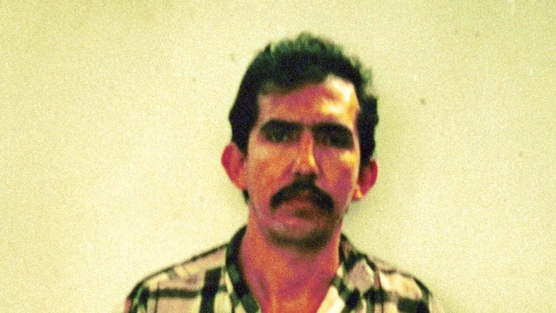 FILE - In this photo released by Colombian police, Luis Alfredo Garavito is seen in this undated police mug shot in Bogota, Colombia. A proposal to grant early release from prison to Garavito, one of the world's most prolific serial killers who confessed to killing about 190 children, has raised outrage in Colombia and a denunciation on Monday, Nov. 1, 2021 from President IvÃ¡n Duque. (Colombia Police via AP, File)