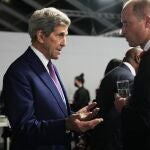 Britain's Prince William, right, speaks with John Kerry, United States Special Presidential Envoy for Climate, during a meeting with Earthshot prize winners and heads of state on the sidelines of the COP26 U.N. Climate Summit in Glasgow, Scotland, Tuesday, Nov. 2, 2021. The U.N. climate summit in Glasgow gathers leaders from around the world, in Scotland's biggest city, to lay out their vision for addressing the common challenge of global warming. (AP Photo/Alastair Grant, Pool)