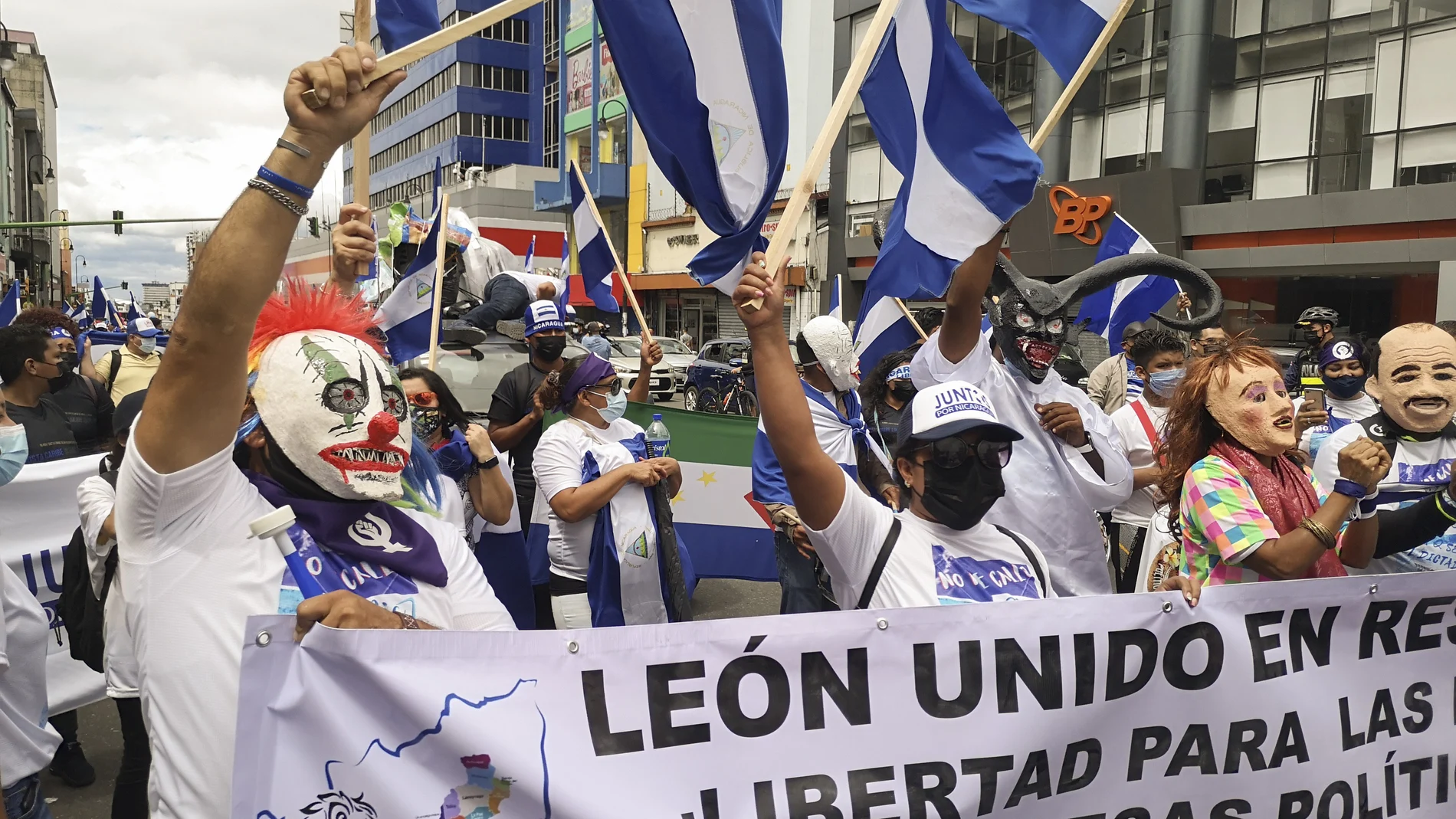 Nicaraguan citizens protest against President Daniel Ortega in San Jose, Costa Rica, Sunday, Nov. 7, 2021. Ortega seeks a fourth consecutive term against a field of little-known candidates while those who could have given him a real challenge sit in jail. (AP Photo/Javier Cordoba)