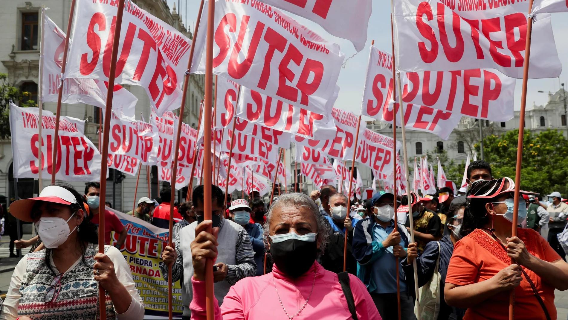 Public teachers from the Unitary Union of Education Workers of Peru (SUTEP) march to demand better working conditions in Lima, Peru, November 23, 2021. REUTERS/Sebastian Castaneda
