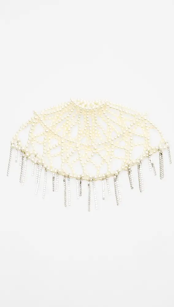 Casquete de perlas con detalles joya, de Zara