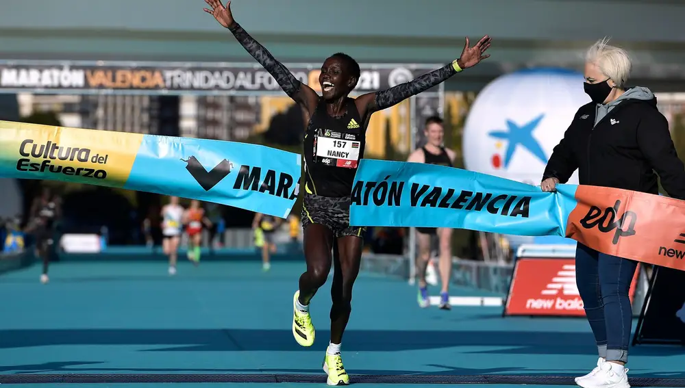 Athletics - Valencia Marathon - Valencia, Spain - December 5, 2021 Kenya's Nancy Jelagat celebrates winning the women's race REUTERS/Pablo Morano