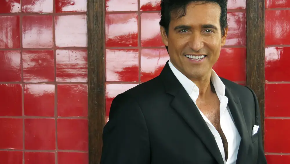 FILE - Spanish singer Carlos Marin poses for a portrait in Mexico City on Aug. 26, 2016. Marin, a Spanish singer and a member of the group II Divo, died Sunday, Dec. 19, 2021, following a hospitalization, according to an announcement by the remaining members of the vocal group. He was 53. (AP Photo/Berenice Bautista, File)