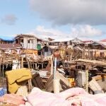 Foto facilitada por Greenpeace muestra una zona afectada por el tifón Rai en la ciudad de Surigao, en el sur de Filipinas
