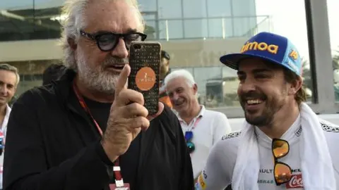 Fernando Alonso junto a Flavio Briatore
