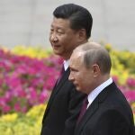 El presidente chino, Xi Jinping y su homólogo ruso, Vladimir Putin en un encuentro el pasado mes de junio