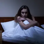Mujer con Insomnio