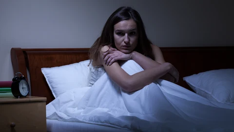 Mujer con Insomnio