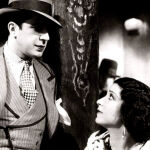 Carlos Gardel (izq.) en "Melodía de arrabal", de 1933