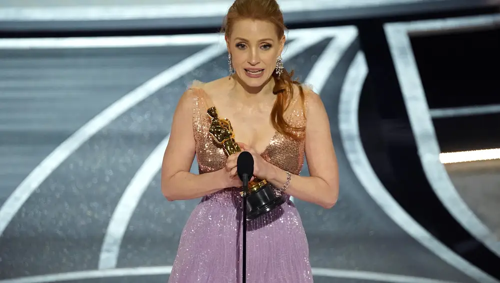 Jessica Chastain accepts the award for best performance by an actress in a leading role for &quot;The Eyes of Tammy Faye&quot; at the Oscars on Sunday, March 27, 2022, at the Dolby Theatre in Los Angeles. (AP Photo/Chris Pizzello)