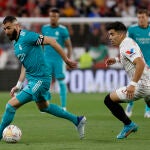 Marcos Acuña con el Sevilla. EFE/Julio Muñoz