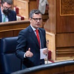 El ministro de la Presidencia, Félix Bolaños, interviene en una sesión plenaria, en el Congreso de los Diputados