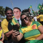 Simpatizantes del presidente Jair Bolsonaro participan en una manifestación con motivo del Día del Trabajo
