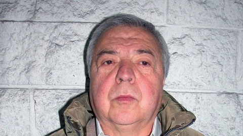 Fotografía de archivo cedida por la SIJIN y fechada el 3 de diciembre de 2004 que muestra al capo colombiano del narcotráfico Gilberto Rodríguez Orejuela, antes de ser extraditado a los Estados Unidos