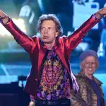 Mick Jagger, centre, and Keith Richards, back right, of the band the Rolling Stones, perform during their Sixty Stones Europe 2022 tour at the Wanda Metropolitano stadium in Madrid, Spain, Wednesday, June 1, 2022. (AP Photo/Manu Fernandez)