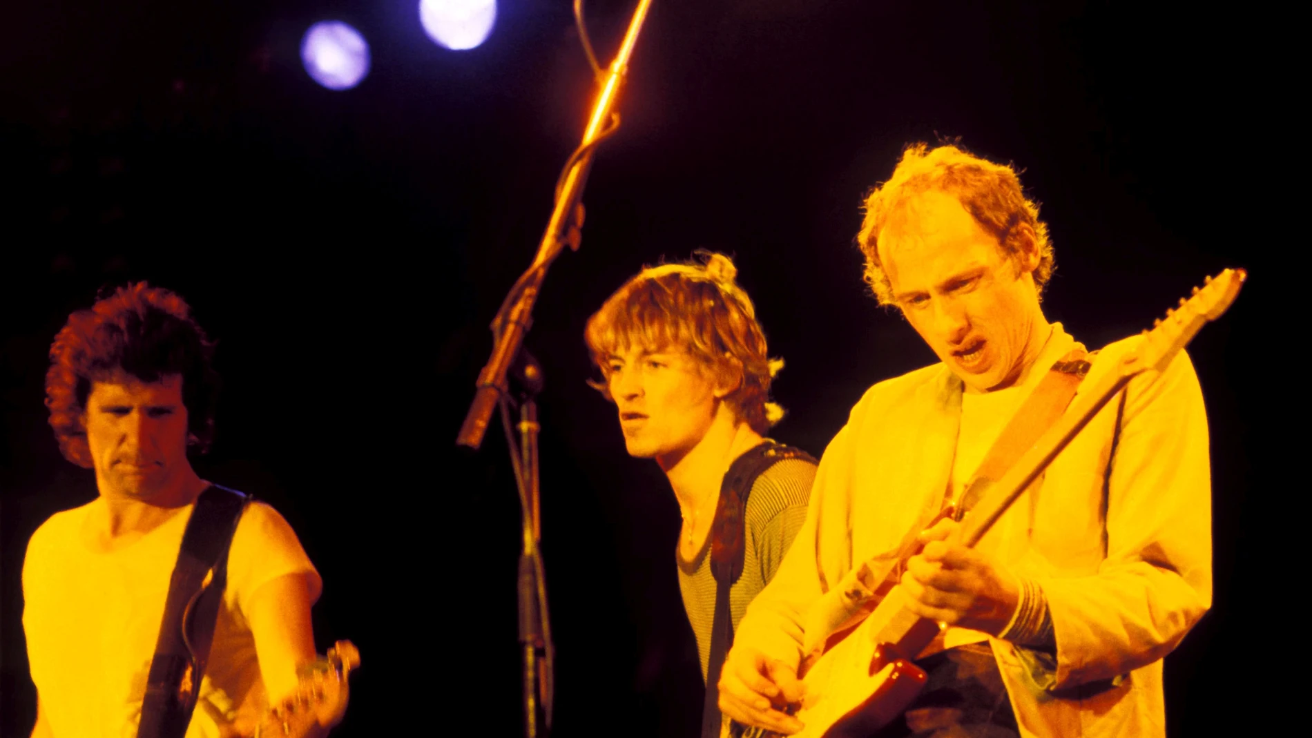 Desde la izda., John Illsley, Dave y Mark Knopfler, fundadores de Dire Straits