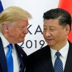 FILE PHOTO: Trump meets Xi at the G20 leaders summit in Osaka, Japan