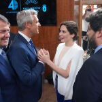 El presidente de la Junta de Castilla y León, Alfonso Fernández Mañueco; el nuevo presidente de la Xunta de Galicia, Alfonso Rueda; la presidenta madrileña, Isabel Díaz Ayuso; y el presidente de la Región de Murcia, López Miras, durante la toma de posesión como presidente de Rueda