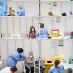 Profesionales sanitarios realizan su trabajo en el Palacio de Fires de Girona donde el Departamento de Salud ha establecido un centro de vacunación masivo