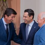 El nuevo Presidente del Consejo Económico y Social, Juan Marín (1i) felicitado por el Presidente de la Junta, Juanma Moreno