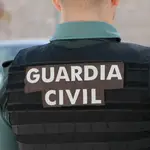 Un agente de la Guardia Civil, de espalda. GUARDIA CIVIL