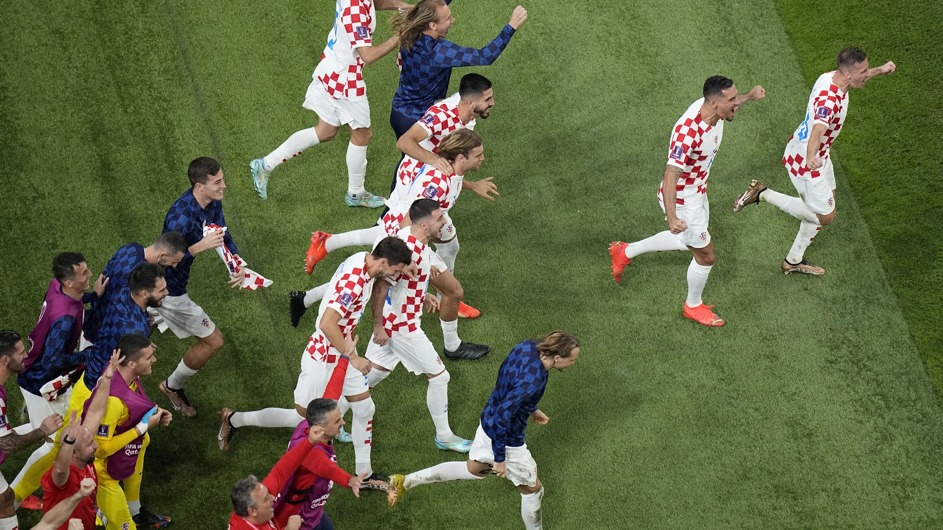 Croatia players celebrate at the end of the World Cup third-place playoff soccer match between Croatia and Morocco at Khalifa International Stadium in Doha, Qatar, Saturday, Dec. 17, 2022. Croatia won 2-1. (AP Photo/Pavel Golovkin)