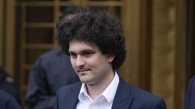 Samuel Bankman-Fried leaves Manhattan federal court in New York, Tuesday, Jan. 3, 2023. Bankman-Fried pleaded not guilty to charges that he cheated investors and looted customer deposits on his cryptocurrency trading platform as a judge set a tentative trial date for October. (AP Photo/Seth Wenig)