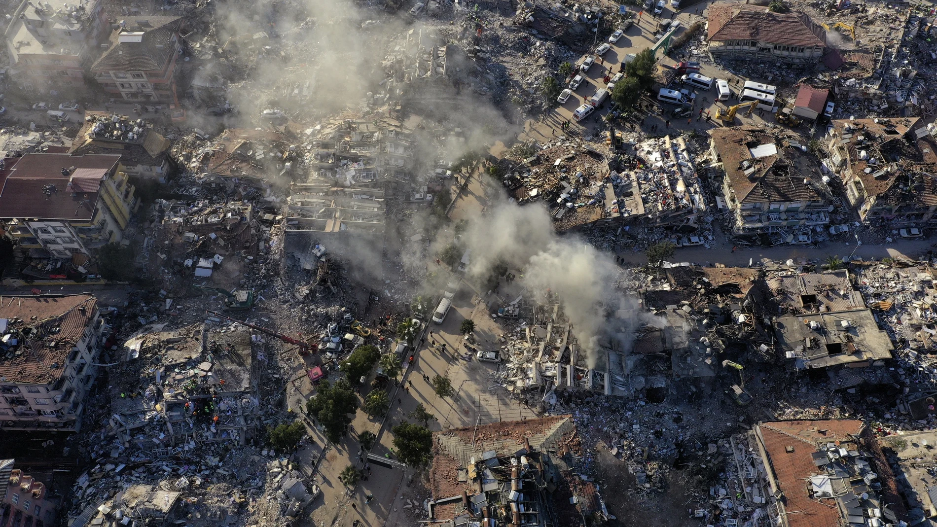 Destroyed buildings are seen from above in Antakya, southeastern Turkey, Thursday, Feb. 9, 2023. Thousands who lost their homes in a catastrophic earthquake huddled around campfires and clamored for food and water in the bitter cold, three days after the temblor and series of aftershocks hit Turkey and Syria. (AP Photo/Hussein Malla)