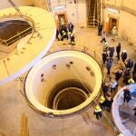 A handout photo made available by Iran's Atomic Energy Organisation shows head of the organisation Ali Akbar Salehi (C) speaks to media during his visits to nuclear water reactor of Arak, in the city of Arak, central Iran.