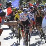 Slovenia&#39;s Tadej Pogacar, wearing the best young rider&#39;s white jersey, attempts to break away from Denmark&#39;s Jonas Vingegaard, wearing the overall leader&#39;s yellow jersey, Sepp Kuss of the U.S., right, and Britain&#39;s Geraint Thomas, left, as they climb Alpe d&#39;Huez during the twelfth stage of the Tour de France cycling race over 165.5 kilometers (102.8 miles) with start in Briancon and finish in Alpe d&#39;Huez, France.