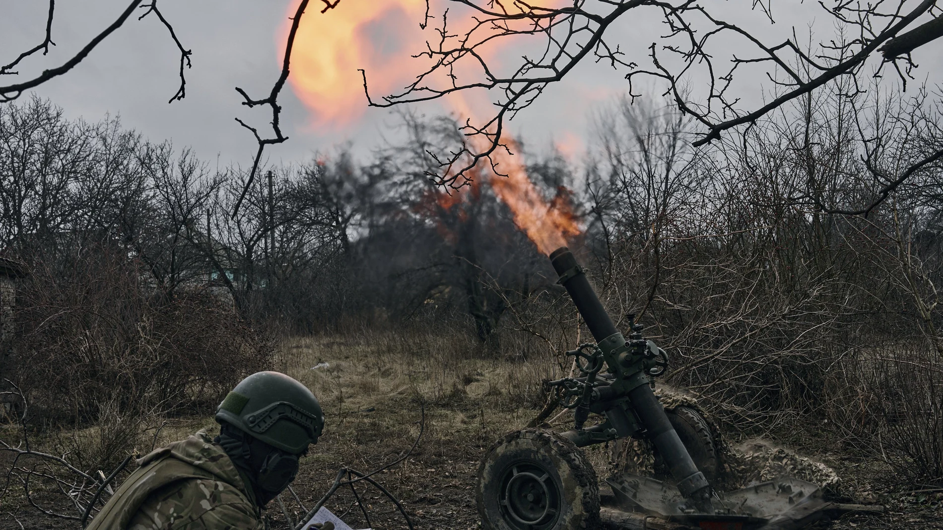 Volunteer soldiers fire towards Russian positions close to Bakhmut, Donetsk region, Ukraine.