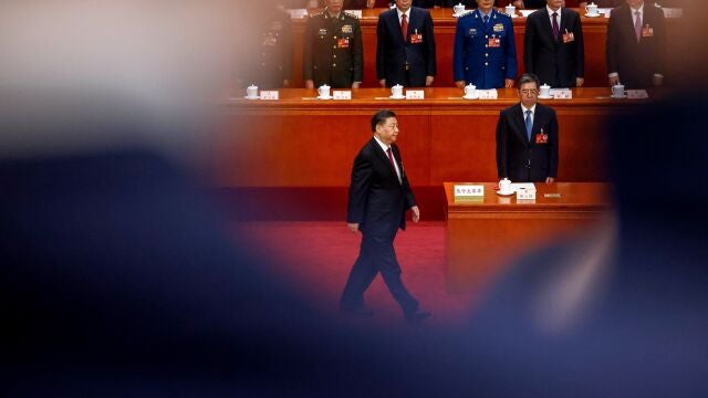 Chinese President Xi Jinping prepares to take his oath during the Third Plenary Session of the National People's Congress (NPC) at the Great Hall of the People, in Beijing, China, 10 March 2023. China holds two major annual political meetings, the National People's Congress (NPC) and the Chinese People's Political Consultative Conference (CPPCC) which run alongside and together are known as 'Lianghui' or 'Two Sessions'.