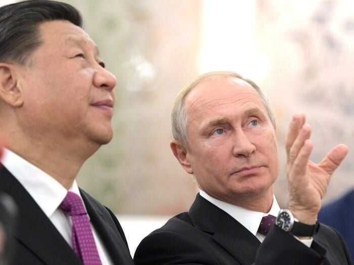  Russian President Vladimir Putin (R) meets with Chinese President Xi Jinping in Moscow