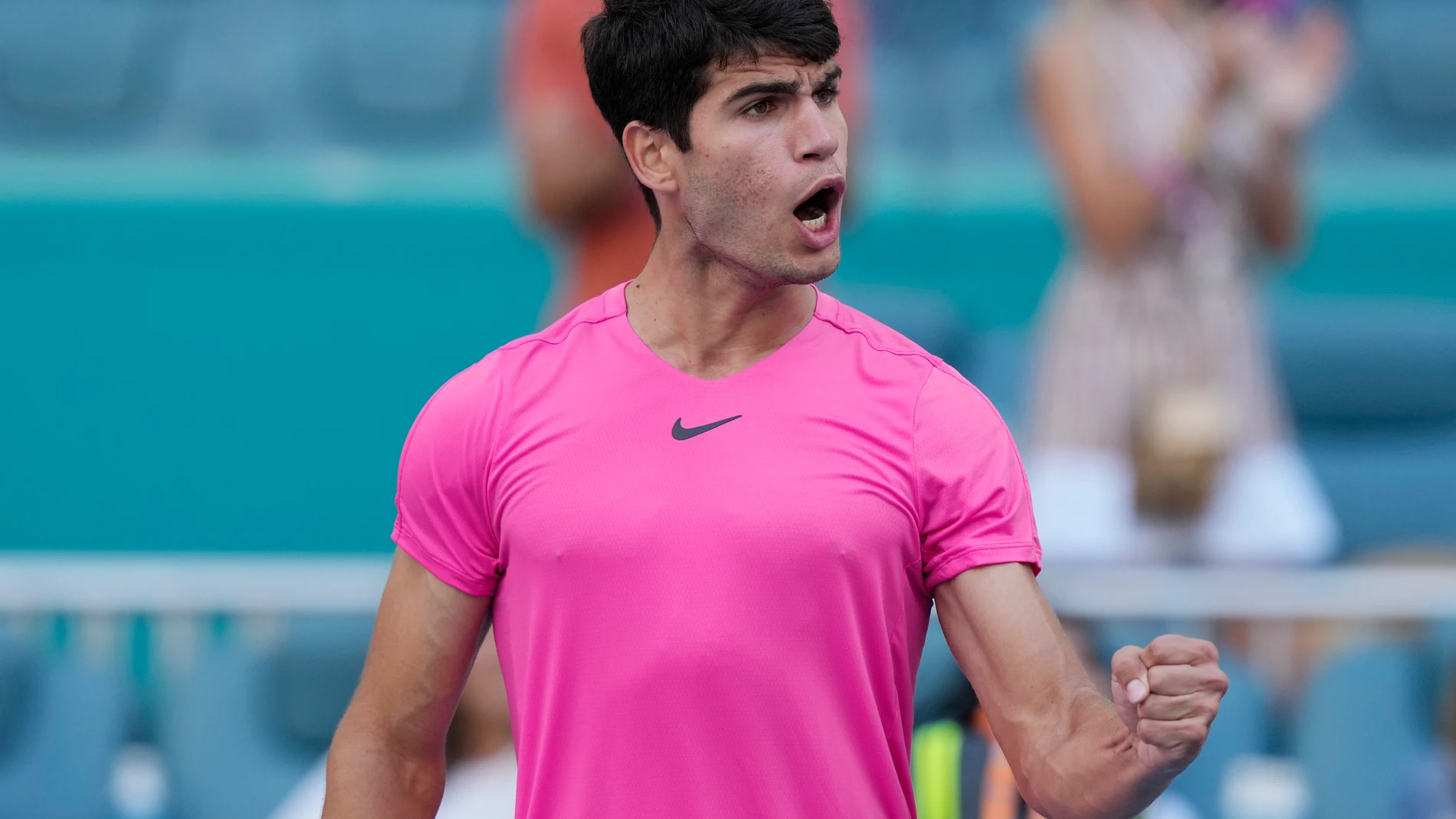 Carlos Alcaraz of Spain reacts after winning a match against Dusan Lajovic of Serbia during the Miami Open tennis tournament, Sunday, March 26, 2023, in Miami Gardens, Fla. (AP Photo/Marta Lavandier)