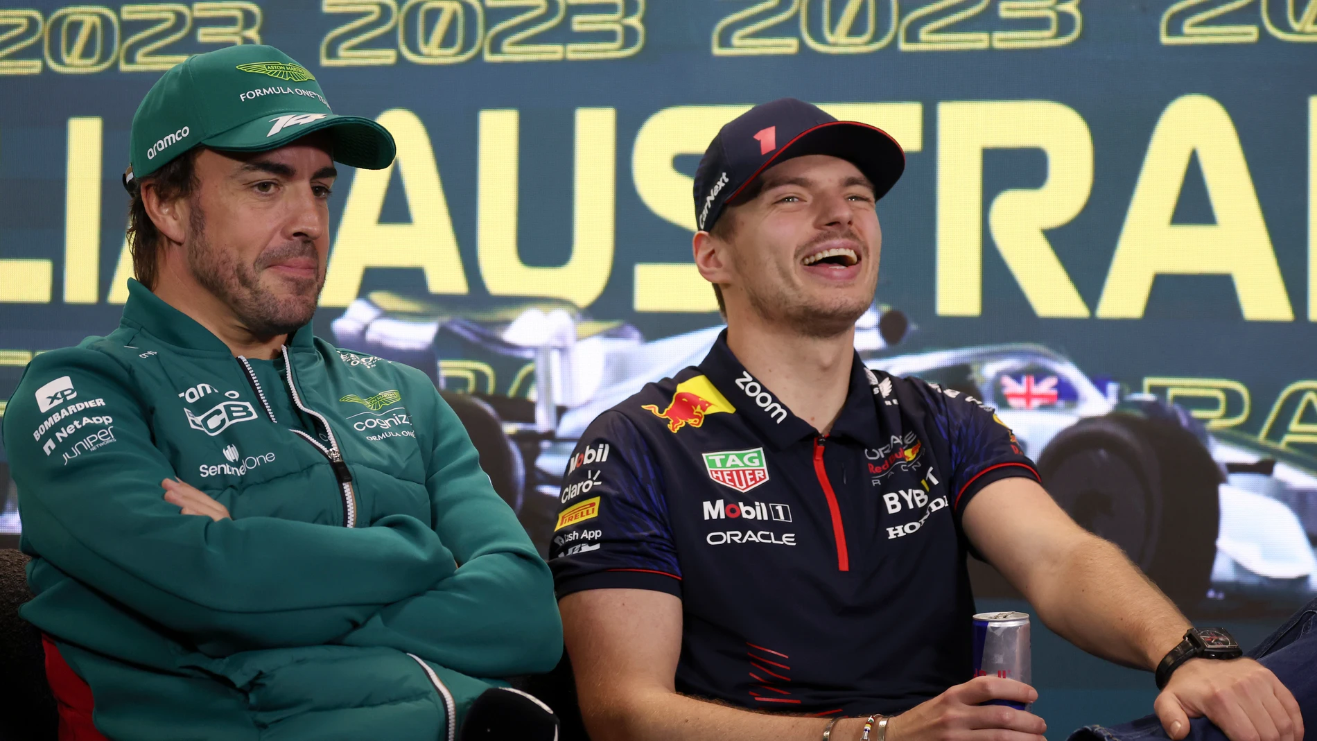 Aston Martin driver Fernando Alonso of Spain, left, and Red Bull driver Max Verstappen of Netherlands chat during a press conference ahead of the Australian Formula One Grand Prix at Albert Park in Melbourne, Thursday, March 30, 2023. (AP Photo/Asanka Brendon Ratnayake)
