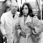 Argentine writer Jorge Luis Borges, accompanied by his secretary Maria Kodama, arrives in Madrid, Spain to receive the Spanish literary prize "Miguel de Cervantes."